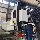 刚刚买下：南通国盛2716龙门加工中心，带刀库，带一个.